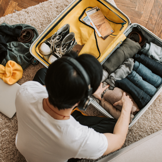 Man in a Suitcase: Dressing Right While Jet-Setting Can Be a Challenge