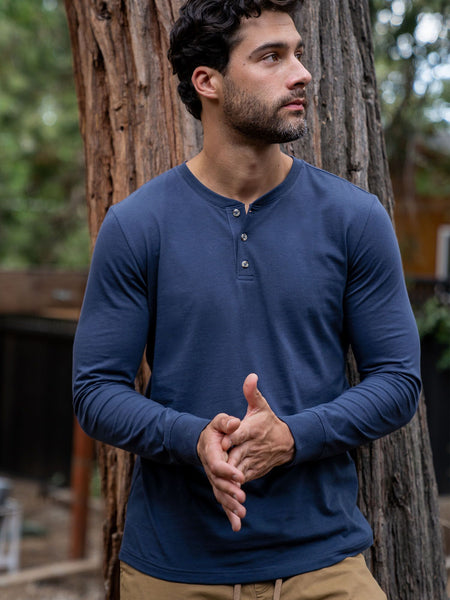 Colt is 6'2, 200lbs and wears a size M # Odyssey Blue Long Sleeve Henley Lifestyle Size Medium | Fresh Clean Threads