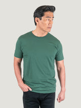 Phil is 6'1, 185lbs and wears a size M # Pine Green Crew Neck Studio Size Medium | Fresh Clean Threads