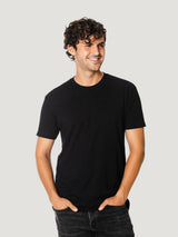 Navid is 6'1, 165lbs and wears size m # All Black Staples 5-Pack | Navid is wearing a Medium black crew neck tee | Fresh Clean Threads
