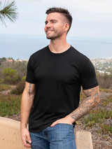 Nolan is 5'10, 190lbs and wears a size M # Black Friday All Black 10-Pack | Crew Neck Tees in Black | Fresh Clean Threads