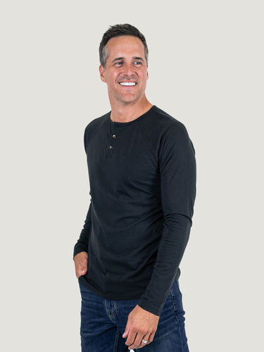 Ben is 6'1, 180lbs and wears a size M # Black Slim Fit Long Sleeve Henley Studio Size Medium | Fresh Clean Threads