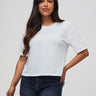 Nathalie is 5'6" and wears a size S # White Boxy Tee  | Cropped Style