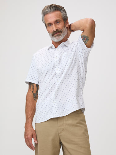 Man wearing a white patterned shirt |  bold character on a shirt built for hard use