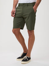 4-way stretch, moisture-wicking # Person wearing olive green shorts | Everyday Shorts, Ultra Comfortable & Soft