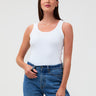 It hugs. But the good kind. # Women's White Ribbed Tank Top – Soft, Fitted & Bra-Friendly