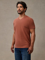 A versatile copper v-neck shirt built for easy, everyday pairing, best for layering under casual jackets
