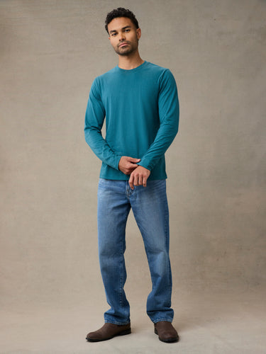 a breathable, true-to-size cotton/poly long sleeve shirt with a relaxed fit, it delivers all-day comfort whether worn solo or as a dependable base layer - Laguna Blue Tees
