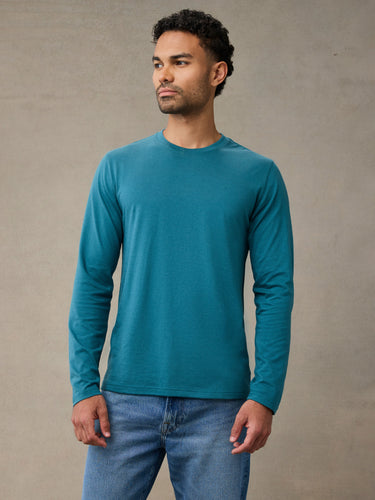 A cool teal blue long sleeve shirt built for real cold-weather coverage