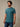 Man wearing teal blue crew neck t-shirt made from StratuSoft™ cotton poly blend