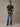 man in muted green crew neck built for outdoor comfort