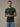 Man wearing muted moss green crew neck t-shirt, best fit