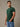 Man wearing moss green crew neck t-shirt