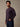 Man wearing deep mulberry colored henley long sleeve shirt