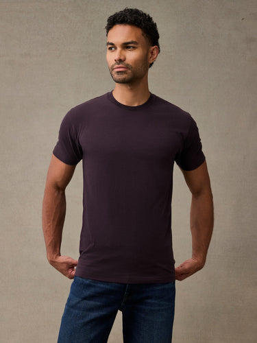 Man wearing deep mulberry colored crew neck t-shirt