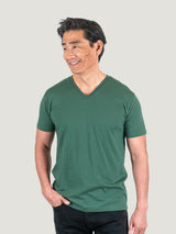 Phil is 6'1, 185lbs and wears a size M # Pine Green V-Neck Studio Size Medium | Fresh Clean Threads