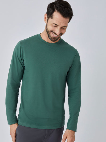 Patrick is 5'10", 163LBS and wears a size M # Alpine Green Long Sleeve Crew Neck Tee | Studio Image Casual | Fresh Clean Threads