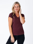 Maddy is 5'8", size 4 and wears a size S # Women's Port Red V-Neck Tee | Fresh Clean Threads