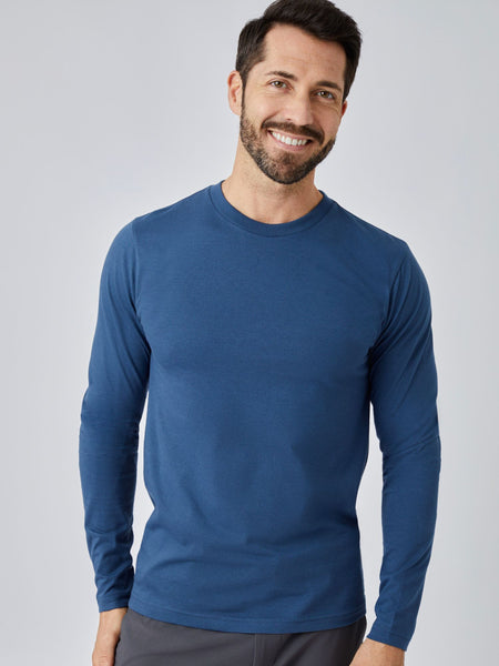 Patrick is 5'10", 163LBS and wears a size M # Steel Blue Long Sleeve Crew Neck | Studio Image | Model Size Medium | Fresh Clean Threads