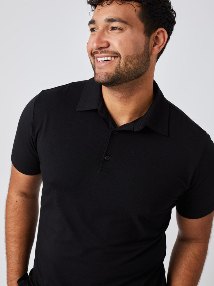 All Black Performance Polo 3-pack Studio Front Angle Model Size XL | Fresh Clean Threads