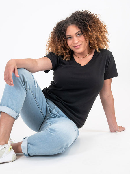 Micah is 5'9, size 10 and wears a size L # Black Friday Women's V-Neck 5-Pack | Black Tee | Fresh Clean Threads