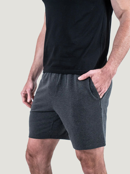 Matt is 6'1, 195LBS and wears a size M # Charcoal Day Off Short | Studio Model Size Medium, Side View | Fresh Clean Threads