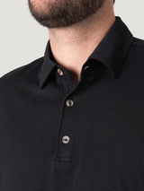 Bryce is 6', 180lbs and wears size m # All Black Staples 5-Pack | Bryce is wearing a medium black polo | Fresh Clean Threads