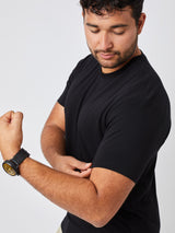 Matheus is 6', 210LBS and wears a size XL # All Black Performance Crew 5-pack Studio Sleeve Detail | Fresh Clean Threads