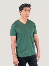 Phil is 6'1, 185lbs and wears a size M # Pine Green V-Neck Studio Size Medium | Fresh Clean Threads