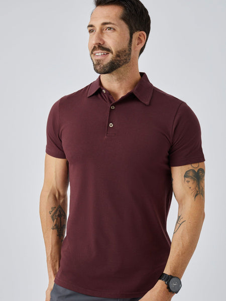 Patrick is 5'10", 163LBS and wears a size M # Fall Foundation Polo 5-Pack 2023 | Port Red Torrey Polo | Fresh Clean Threads