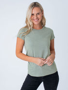 Maddy is 5'8", size 4 and wears a size S # Women's Vintage Green Tee | Fresh Clean Threads