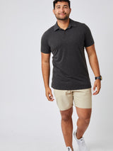 Matheus is 6', 210LBS and wears a size XL # Charcoal Performance Polo Studio Model Size XL | Fresh Clean Threads