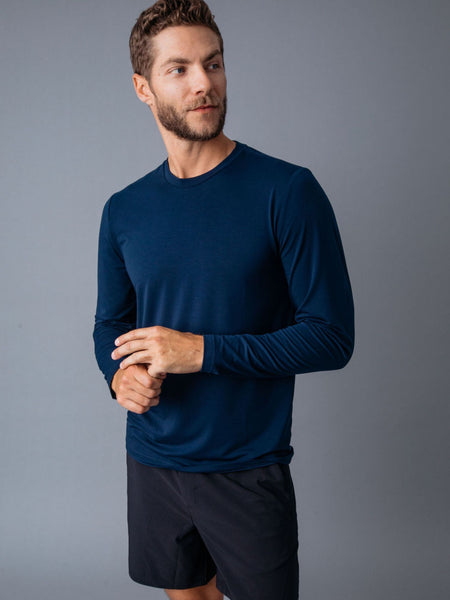 Joe is 6'2, 177LBS and wears a size L # Navy Performance Long Sleeves | Fresh Clean Threads