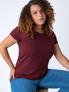 Micah is 5'9, size 10 and wears a size L # Women's Crew Neck Tee Garnet | Fresh Clean Threads