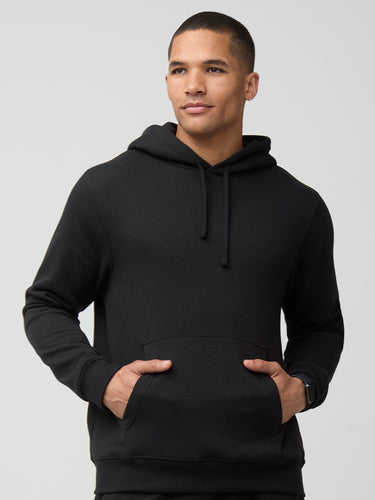 Mikah is 6'1" and wears a size medium # Black Hoodie, Classic Fit  | Fresh Clean Threads