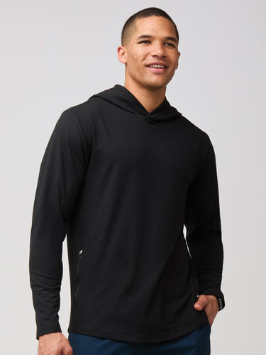 Mikah is 6'1" and wears a size medium # Tech Hoodie in Black | Activewear at Fresh Clean Threads