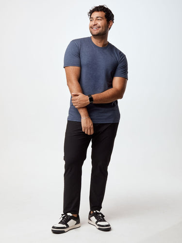 Matheus is 6', 210LBS and wears a size XL # Model wearing Navy Blue Crew Neck from the Summer Basics 5 - Pack with proprietary Stratusoft fabric | Fresh Clean Threads Canada