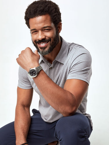 Jarrett is 6', 168lbs and wears a size M # Men's Grey Polo | Fresh Clean Threads