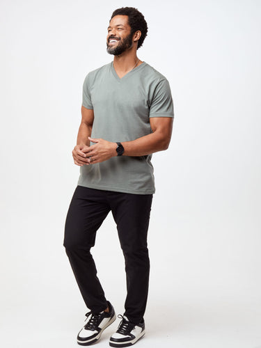 Jarrett is 6', 168lbs and wears a size M # Men's V-Neck | Mercury Green | Fresh Clean Threads