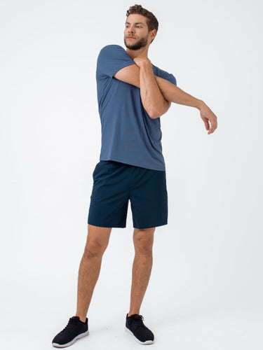 Joe is 6'2, 177LBS and wears a size L # Monsoon Blue Performance Tee | Fresh Clean Threads