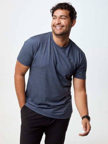 Matheus is 6', 210LBS and wears a size XL # Matheus is wearing size XLarge in FCT's Men's Navy Crew Neck shirt