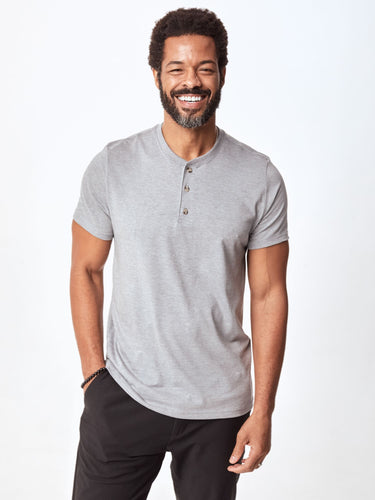 Jarrett is 6', 168lbs and wears a size M # Short Sleeve Henley in Heather Grey | Fresh Clean Threads