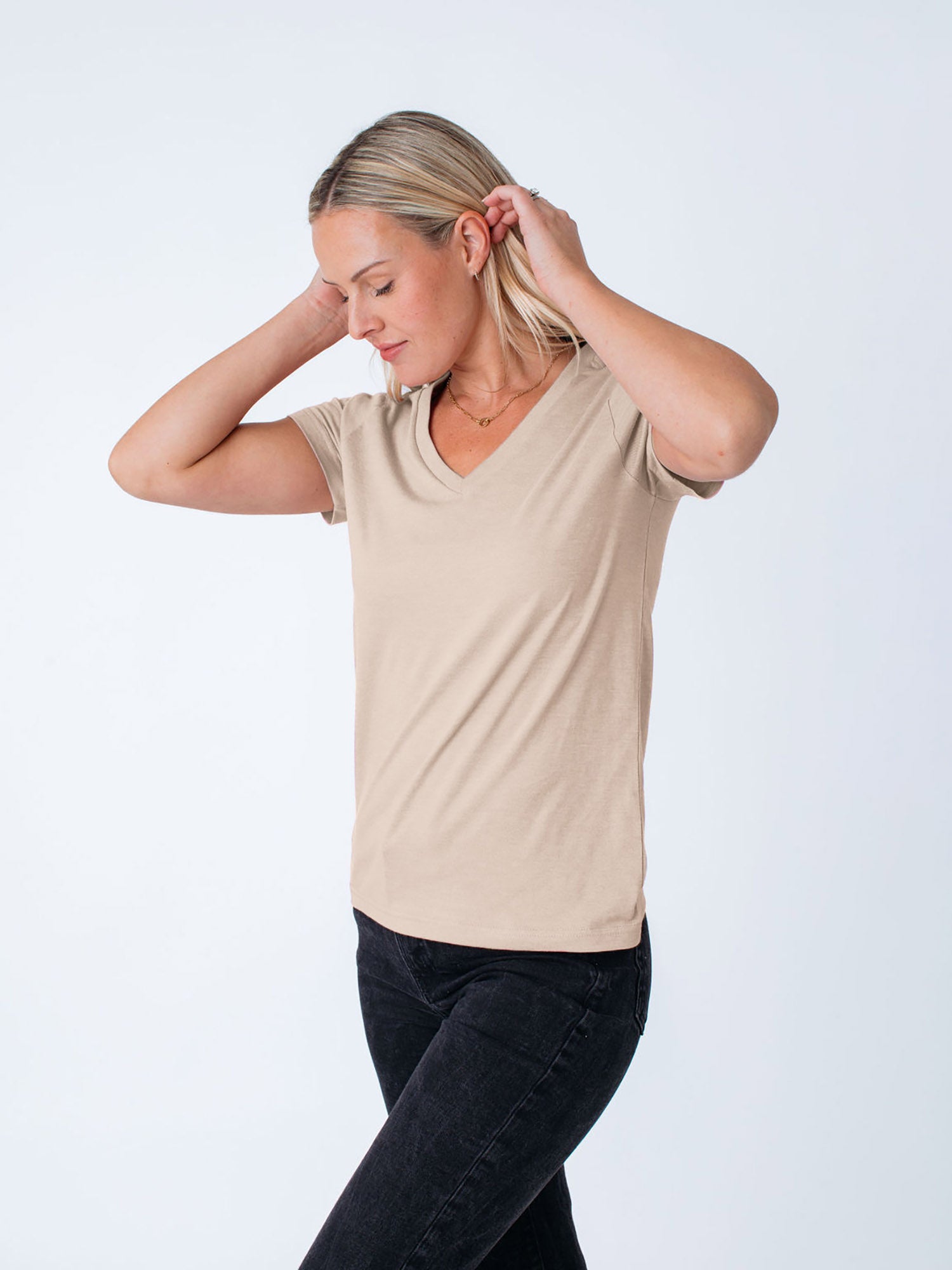 Maddy is 5'8", size 4 and wears a size S # Women's Desert V-Neck Tops | The perfect base tee