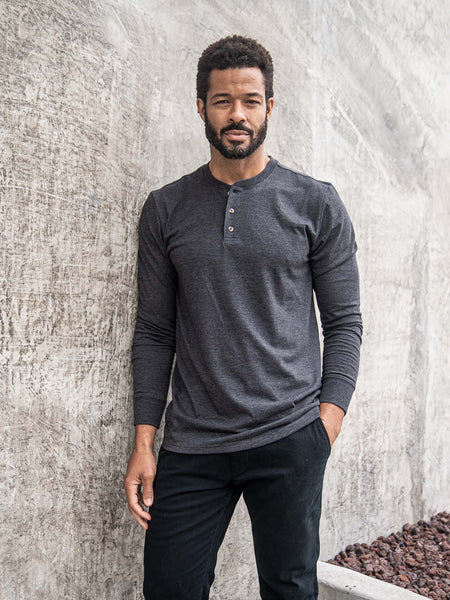 Jarrett is 6', 168lbs and wears a size M # Charcoal Long Sleeve Henley Lifestyle Size Medium | Fresh Clean Threads