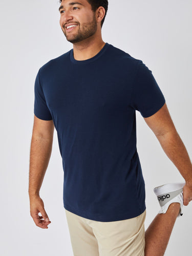 Matheus is 6', 210LBS and wears a size XL # Navy Performance Crew Stretch Model Size XL | Fresh Clean Threads