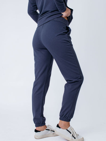 Maddy is 5'8", size 4 and wears a size S # Women's Odyssey Blue Joggers | Fresh Clean Threads