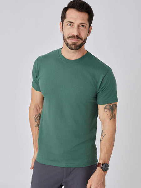 Patrick is 5'10", 163LBS and wears a size M # Alpine Green Crew Neck T-shirt | Studio Model Image | Regular or Tall Lengths | Fresh Clean Threads