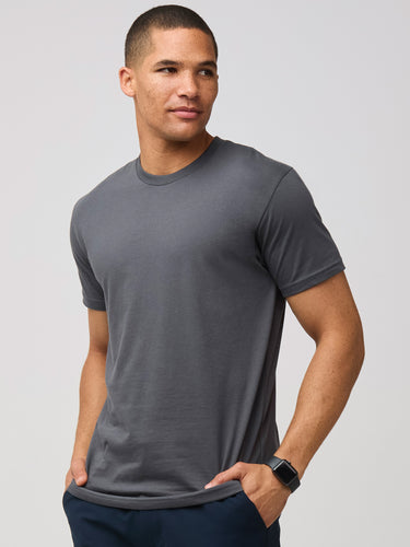 Mikah is 6'1" and wears a size medium # Men's Tee in Concrete Grey at Fresh Clean Threads