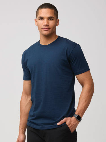 Mikah is 6'1" and wears a size medium # Dark Navy Men's Crew Tees | Fresh Clean Threads