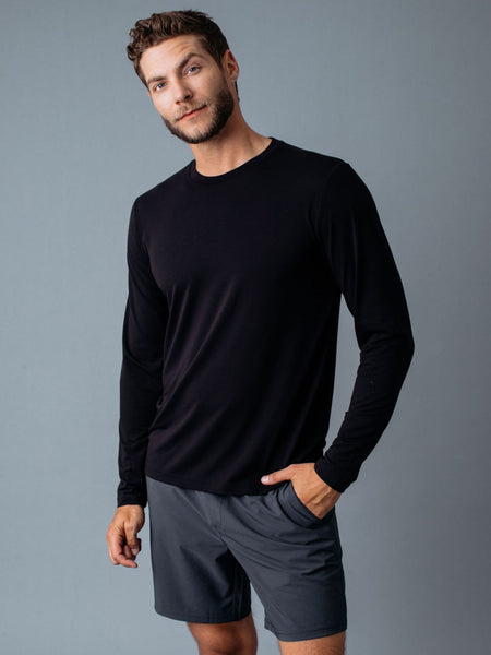 Joe is 6'2, 177LBS and wears a size L # Men's Black Performance Long Sleeve Crew | Fresh Clean Threads